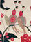 Wall hanging with birds on a branch of flowers