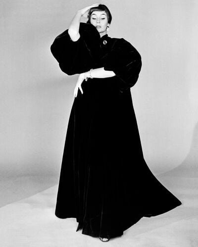 Anne Gunning modelling a velveteen evening coat