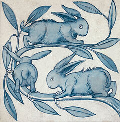 Rabbits running along a branch
