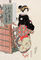 Woman in elegant attire making a visit to a shrine