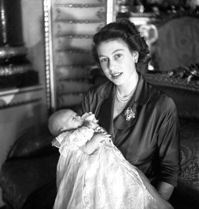 Queen Elizabeth II with newborn Prince Charles