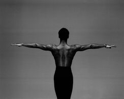 Iain Freeman in outstretched dance pose