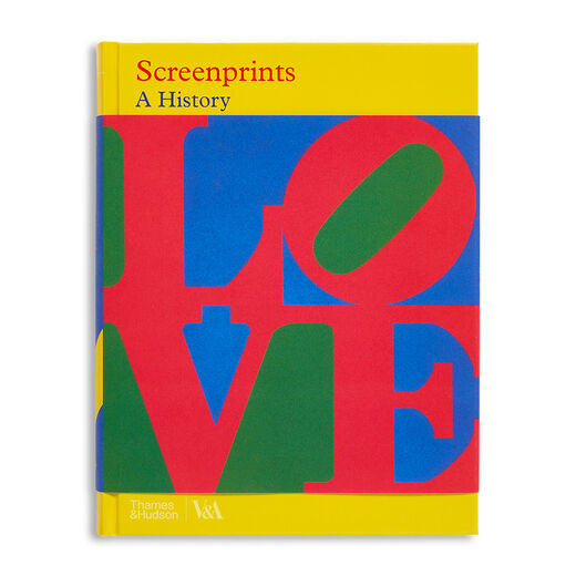 A hardback book featuring with the word 'love' in bright red capital letters on a yellow, green and blue background.