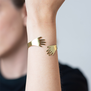Brass hands bracelet by Sibilia