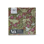A pack of paper napkins featuring a green and red botanical Arts & Crafts pattern by John Henry Dearle.