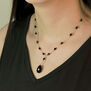 Black onyx and pyrite rosary necklace by Mounir