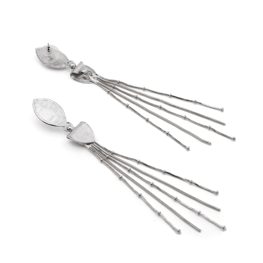Silver drop earrings featuring four strands laying on a white surface. One earring is turned to show its back. 