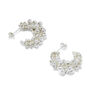 A pair of silver earrings with silver beads.