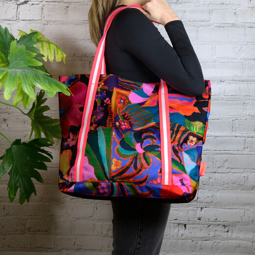 Large tote bag worn on the one shoulder.