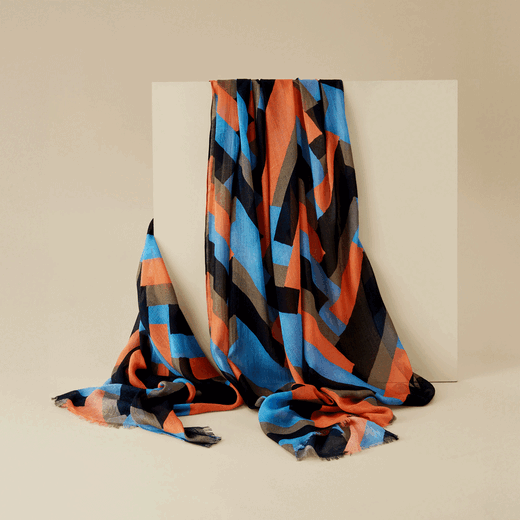 A. Garcelon orange zigzag modal scarf