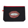 Black cotton zipper pouch featuring a striking print illustrating a ruby lip design from Salvador Dal&iacute;  