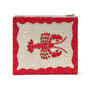 red and white clutch bag adorned with glass beads 