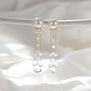 Pearl and moonstone chandelier earrings by Mounir