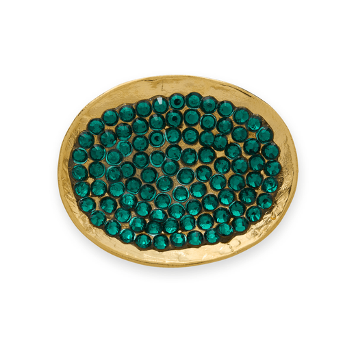 The top of a ring featuring small green crystals.