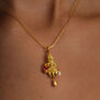 Ruby and pearl clown necklace by Ruby Jack