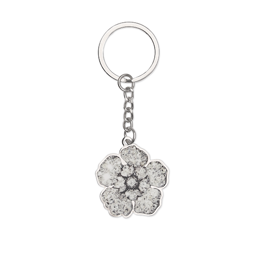 Metal keyring featuring a flower diamond design