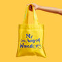A yellow kids tote bag with a blue text.