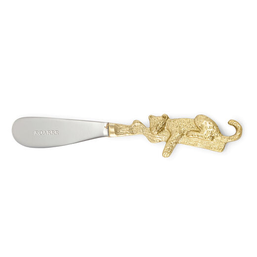 Butter knife with a gold coloured handle in the shape of a leopard perching on a branch.
