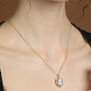 Hand-carved porcelain cameo necklace by Vintouch