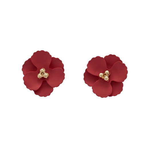 A pair of small stud earrings in the shape of a red flower.