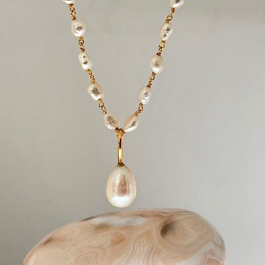 Freshwater pearl pendant rosary necklace by Mirabelle