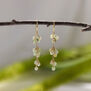 Green garnet grape hook earrings by Mounir