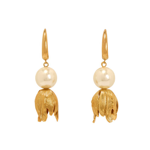 Gold hook earrings featuring a white pearl and a lily shaped pendant.