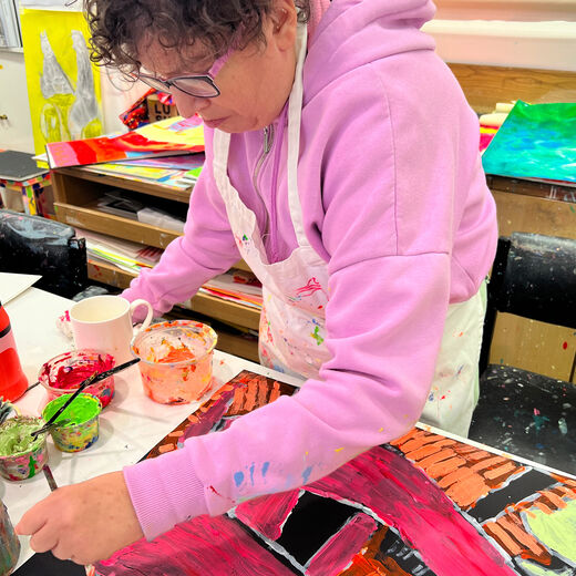 ARTHOUSE Unlimited artist Philippa Morrison while paiting.