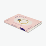 A pink book cover with an image of a gold ring with a blue gem in its centre