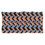 A modal scarf featuring a zigzag Art Deco pattern.