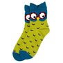 A pair of socks featuring a cartoonish owl print. 