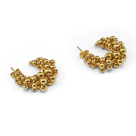 Hoop gold earrings adorned with beads.