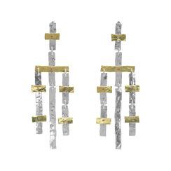 Mixed metal statement earrings by Kate Trouw
