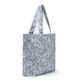 A spacious pastel blue tote bag featuring a deep gusset and a floral pattern.