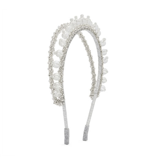 A metallic headband imitating a tiara, featuring two rows of glass beads.