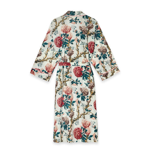 The back of a dressing gown featuring a floral pattern complete with a waist belt.