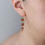 Orange garnet grape hook earrings by Mounir
