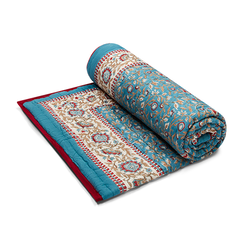 Blue and red floral hand-printed quilt
