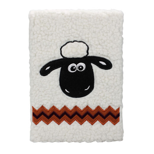 Lined A5 notebook with plushie white cover and illustration of Shaun the Sheep