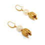 A pair of gold hook earrings each featuring a round faux pearl and a pendant in the shape of a lily bud.