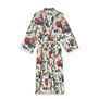 Dressing gown featuring a teal and red floral pattern on white.