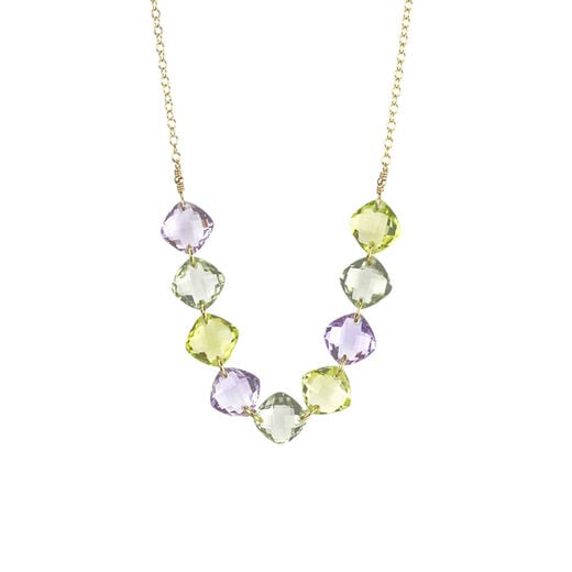 A gold chain necklace featuring pastel green and lilac cushion cut stones.