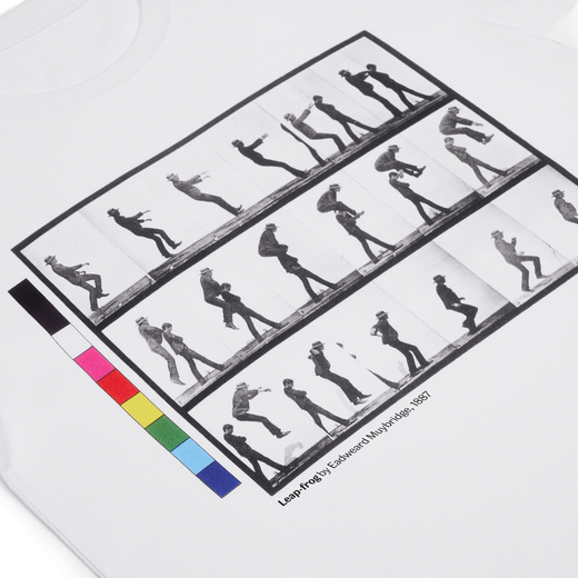 A close up of the front print of a white t-shirt. The print depicts a series of black and white photos of a man jumping.