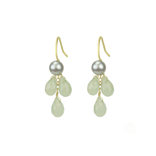 A paid of hook earrings with turquoise pendant stones.