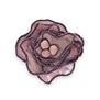 Brooch featuring a recycled textile and ebroidered pink flower