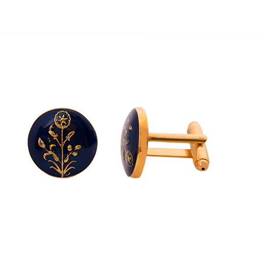 A pair of gold and blue cufflinks featuring an hibiscus branch, handpainted with enamel.