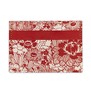 Leather cardholder featuring a red and white floral pattern. 