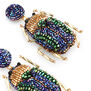 Beetle beadwork earrings by Olivia Dar