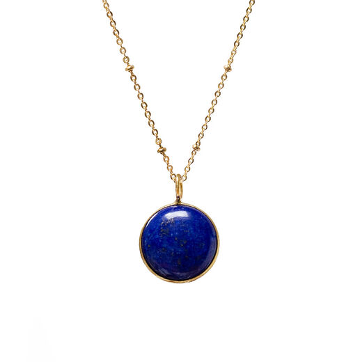 Gold chain necklace featuring a round deep blue pendant.