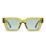A pair of sunglasses with a boxy transparent green frame.